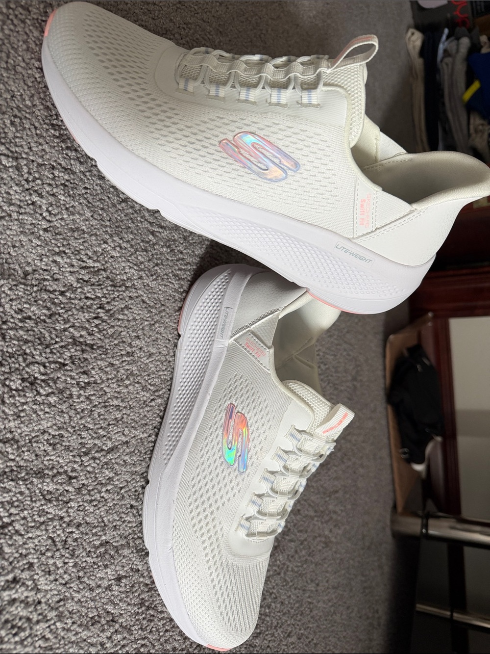 Skechers Women’s White Slip-On Athletic Sneakers with Iridescent Logo